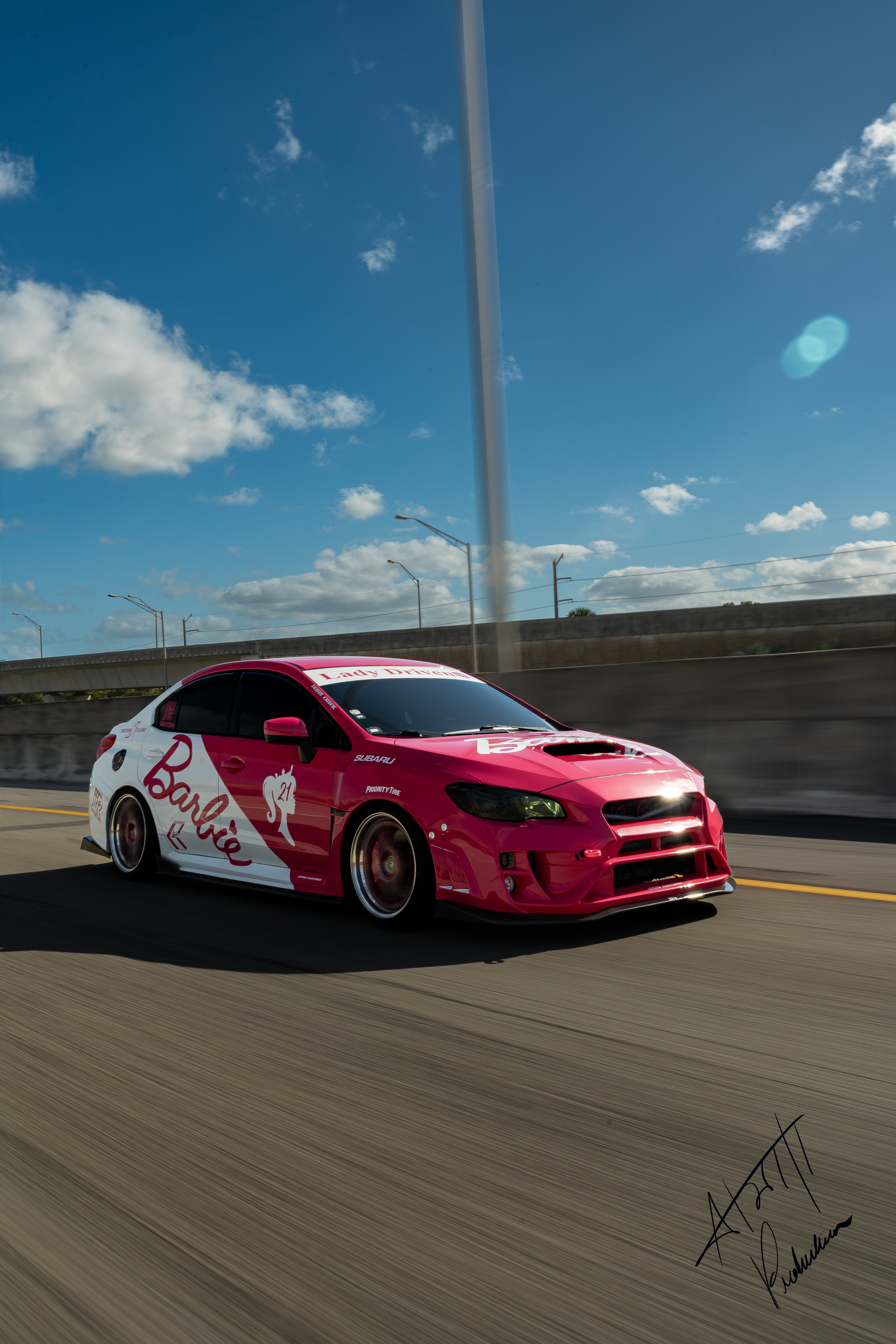 Stephanie’s bright pink Boosted Pinky Subaru WRX